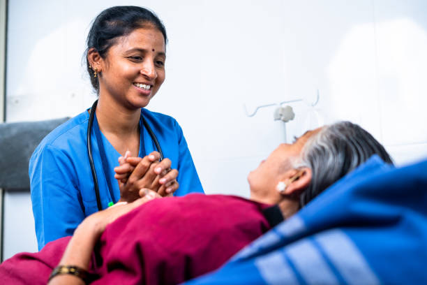 Nurse helping an elderly patient